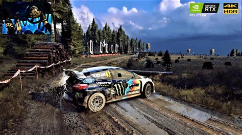 A Dirt Rally 2.0 játék logoja és egy versenyautó a rajtvonalon