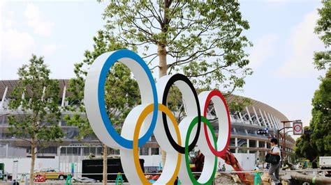 Tokiói lakosok tüntetése az Olimpia ellen