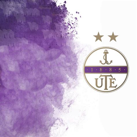 Újpest FC címer és a lelkes szurkolók a stadionban