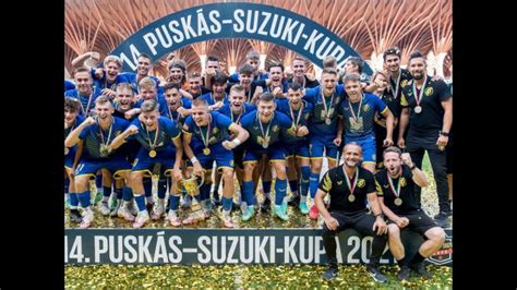 Puskás-Suzuki Kupa logója és a résztvevő csapatok címerei