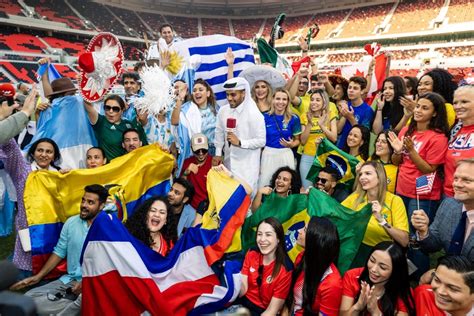 Fans with team colors and flags