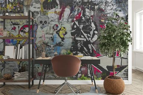 Graffiti művészet egy sportikonnal és inspiráló idézettel a KICK Offices falán