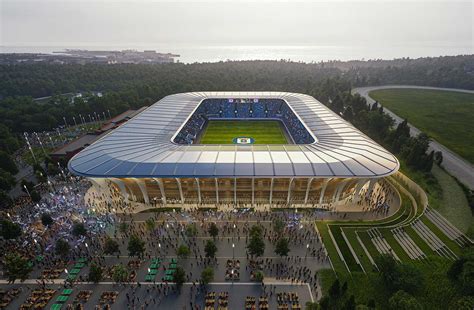 Futballpálya és stadion képe Luxemburgban, egy luxemburgi klubcsapat logójával