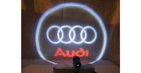Audi kilépőfény vetített logóval