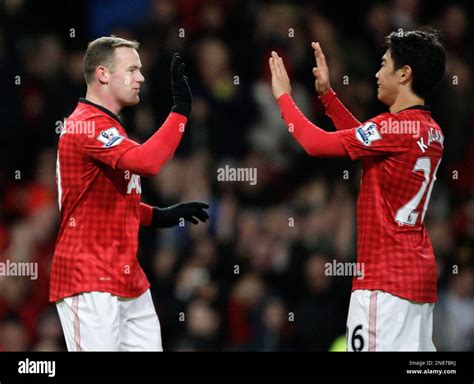 Wayne Rooney és Shinji Kagawa