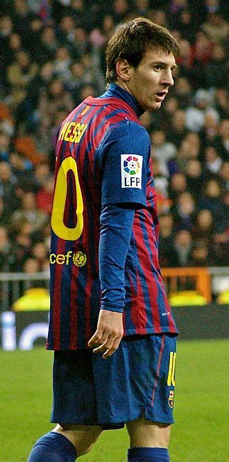 Lionel Messi a Bajnokok Ligája trófeával 2015-ben