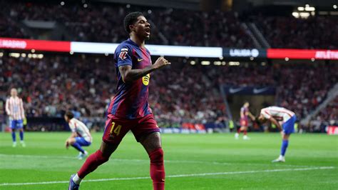 Atlético Madrid és Barcelona játékosok az összecsapáson