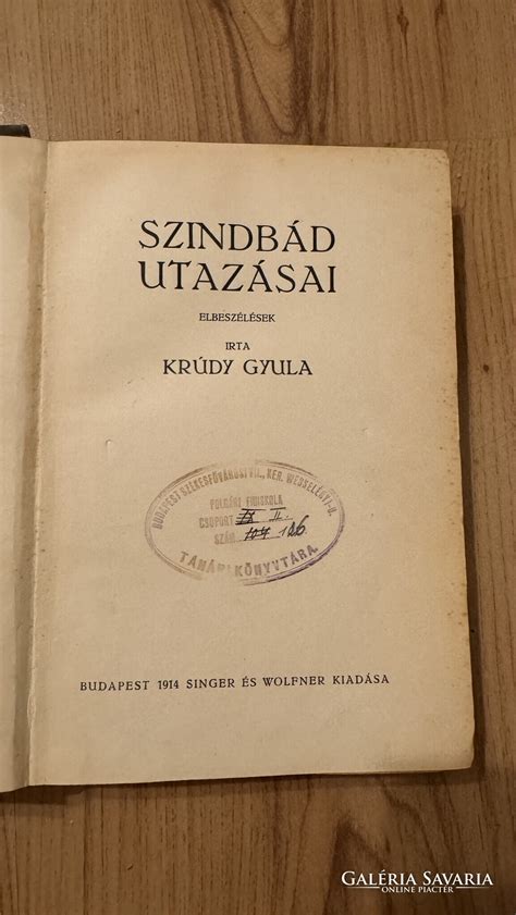 Singer és Wolfner kiadó emblémája egy régi könyvön