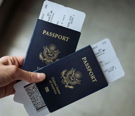 Passport and boarding pass next to a football scarf
