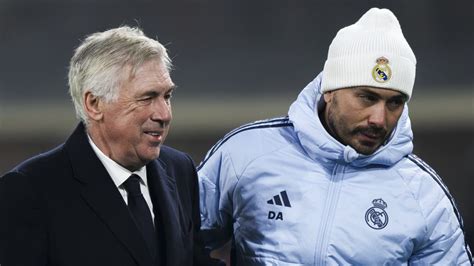Carlo Ancelotti és játékosai ünneplik a győzelmet