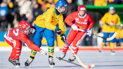 Kids playing bandy on outdoor ice in a Swedish small town