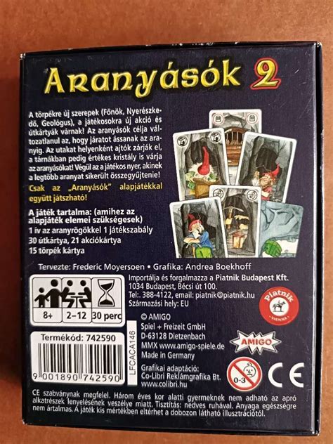 Aranyásók társasjáték asztalnál játszó emberek