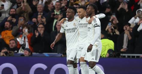 A Real Madrid és az Arsenal csapatok logói