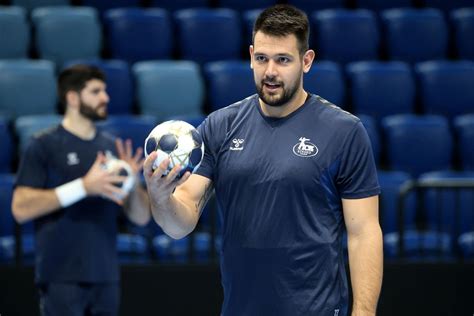 A férfi kézilabda Bajnokok Ligája logója egy kézilabda labdával és stadion háttérrel