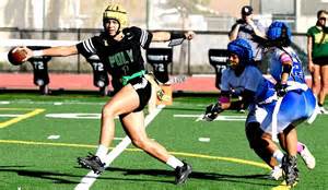 Flag football játékosok akcióban, zászló letépésével