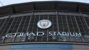 Az Etihad Stadion és a klub pénzügyi központja